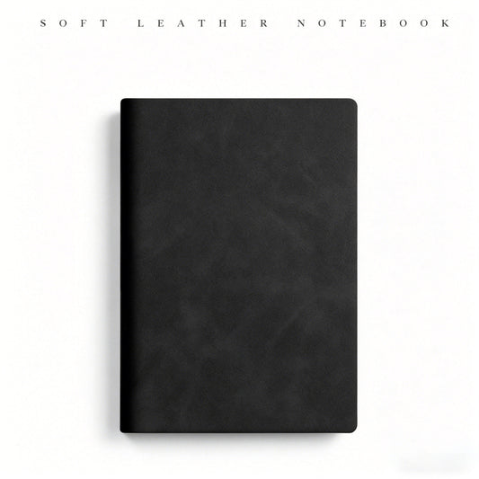 VEYRO Everyday Planner — minimal black A6 notebook with parchment-style leather cover on a white background