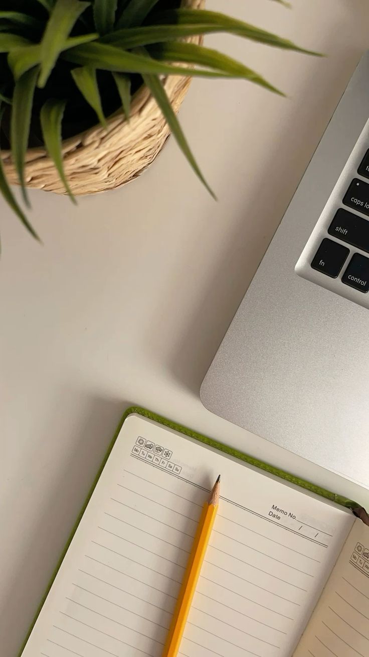 Open pocket notebook with handwritten travel notes outdoors